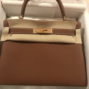 Hermès Kelly 28 Gold Togo Gold Hardware GHW