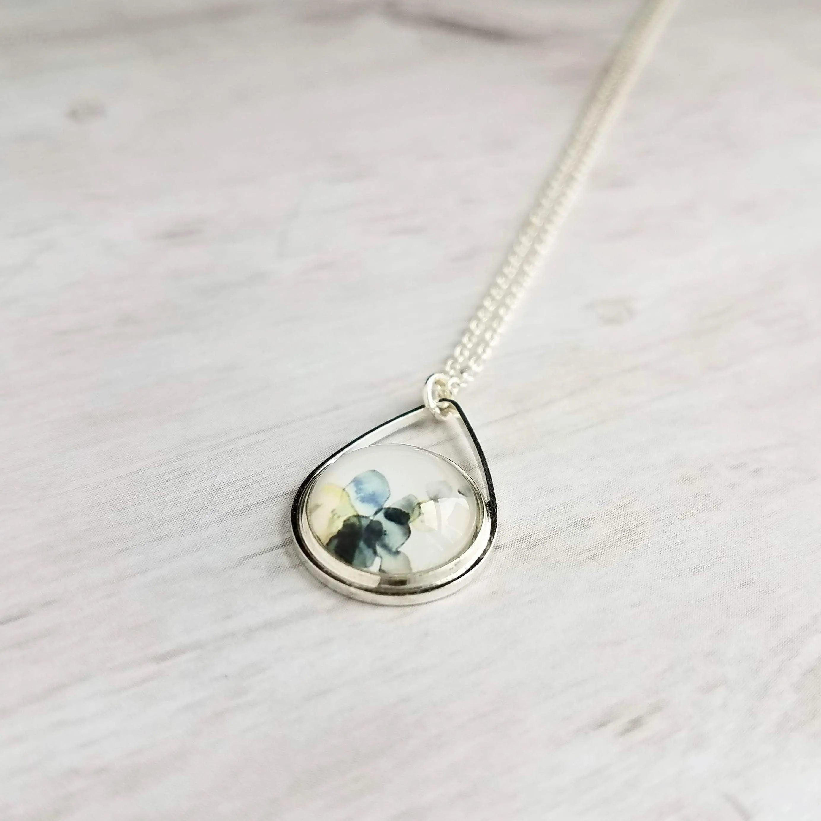 Watercolor Necklace, silver teardrop pendant, blue grey white yellow pendant, delicate silver chain, splotch teardrop pendant, alcohol ink style picture, art necklace
