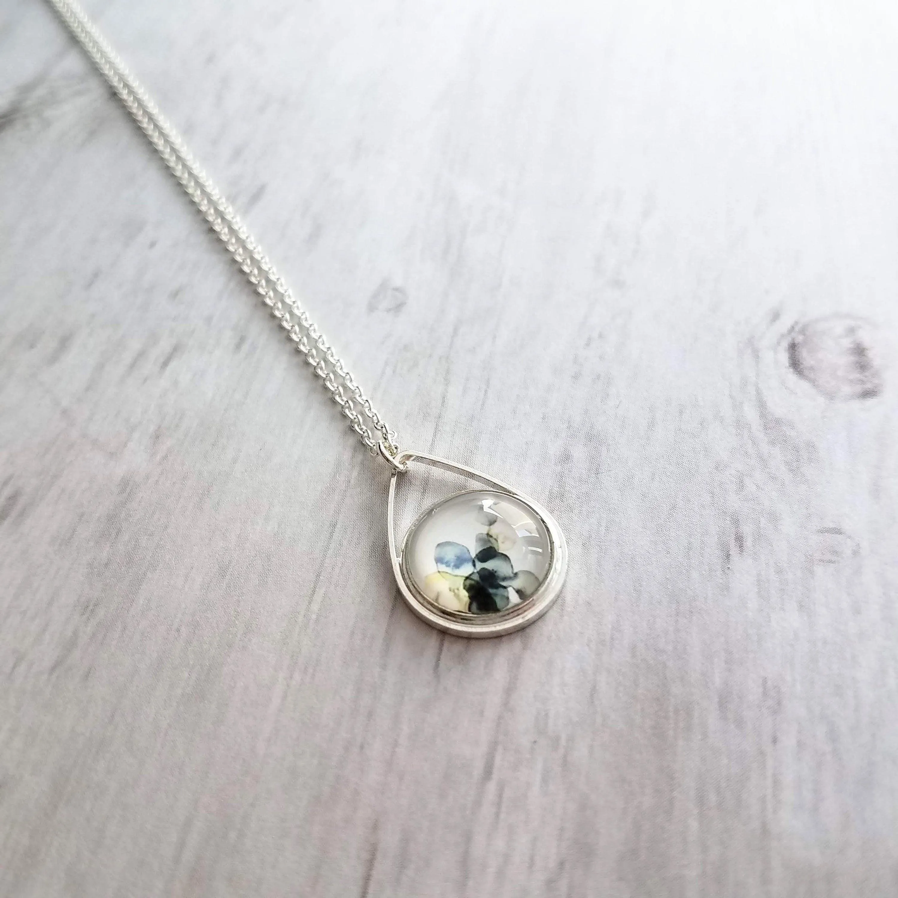 Watercolor Necklace, silver teardrop pendant, blue grey white yellow pendant, delicate silver chain, splotch teardrop pendant, alcohol ink style picture, art necklace